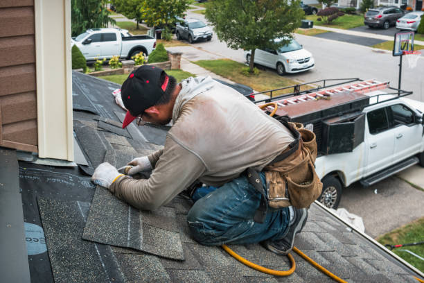 Professional Metal Roofing technician working in Elmwood, MA